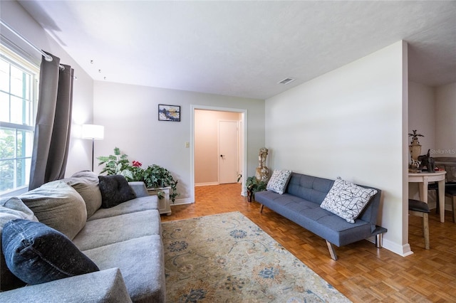 5022 NW 34th Ter, Gainesville, FL 32605 - living area featuring baseboards