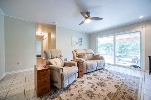 5022 NW 34th Ter, Gainesville, FL 32605 - living area with light tile patterned floors and a ceiling fan