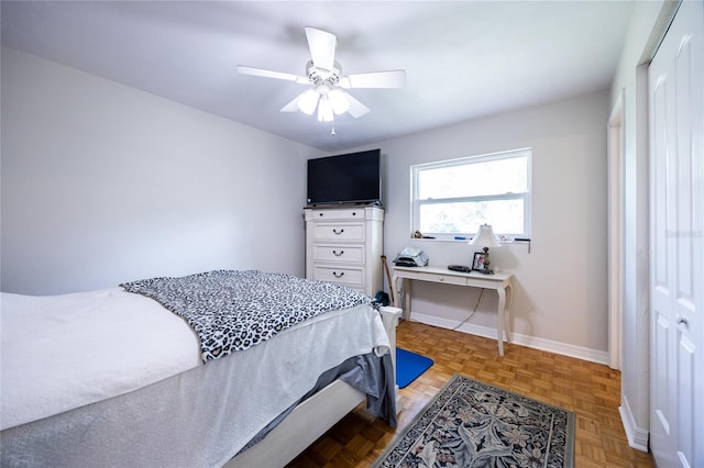 5022 NW 34th Ter, Gainesville, FL 32605 - bedroom featuring ceiling fan and baseboards