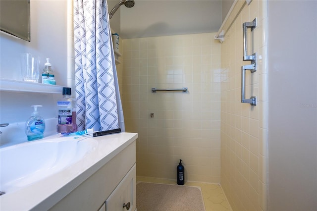 5022 NW 34th Ter, Gainesville, FL 32605 - bathroom featuring tiled shower and vanity