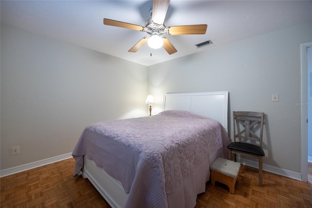 5022 NW 34th Ter, Gainesville, FL 32605 - bedroom featuring baseboards and ceiling fan
