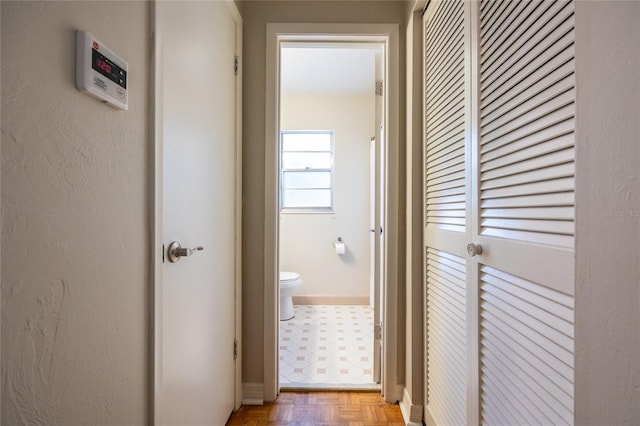 5022 NW 34th Ter, Gainesville, FL 32605 - corridor with baseboards