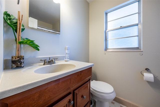 5022 NW 34th Ter, Gainesville, FL 32605 - half bathroom featuring vanity and toilet