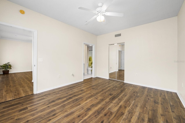 5133 SW 91st Ct Unit G202, Gainesville, FL 32608 - unfurnished bedroom with wood finished floors, ensuite bathroom, a ceiling fan, and a closet