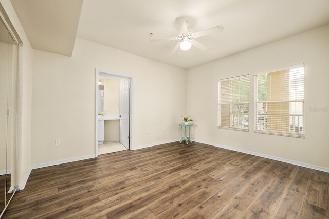 5133 SW 91st Ct Unit G202, Gainesville, FL 32608 - unfurnished bedroom featuring wood finished floors, ensuite bathroom, and ceiling fan