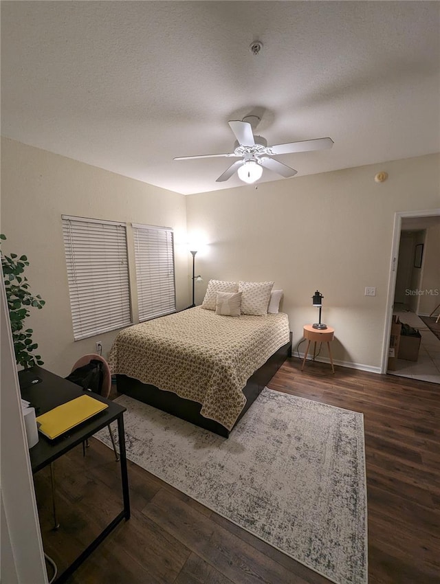 5133 SW 91st Ct Unit G202, Gainesville, FL 32608 - bedroom featuring wood finished floors and ceiling fan