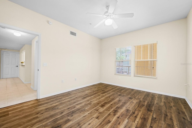 5133 SW 91st Ct Unit G202, Gainesville, FL 32608 - empty room featuring wood finished floors and a ceiling fan