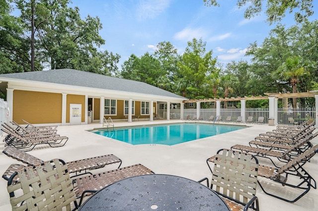 5133 SW 91st Ct Unit G202, Gainesville, FL 32608 - community pool with a patio and view of scattered trees