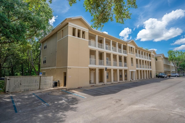 5133 SW 91st Ct Unit G202, Gainesville, FL 32608 - view of apartment building / complex featuring uncovered parking