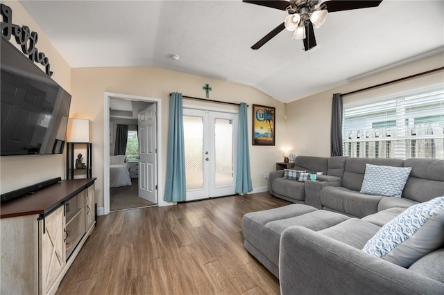 25111 SW 6th Ln, Newberry, FL 32669 - living room featuring dark wood-style floors, lofted ceiling, a ceiling fan, and french doors