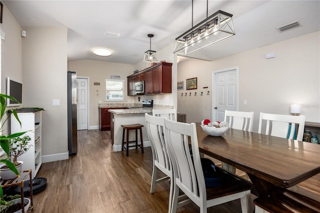 25111 SW 6th Ln, Newberry, FL 32669 - dining space featuring dark wood finished floors and baseboards