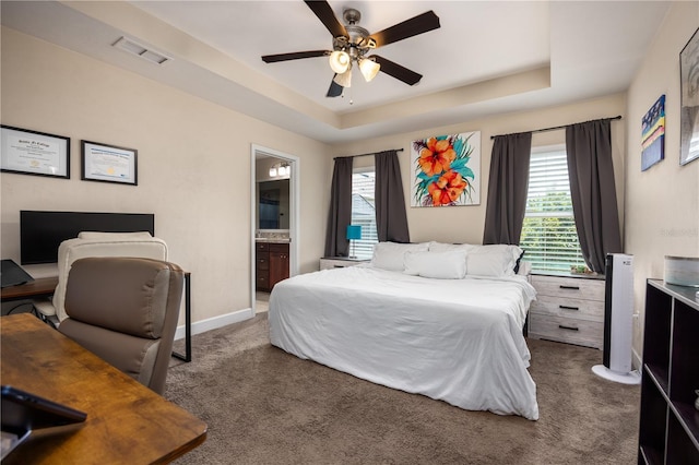 25111 SW 6th Ln, Newberry, FL 32669 - bedroom with carpet floors, multiple windows, a raised ceiling, and ceiling fan