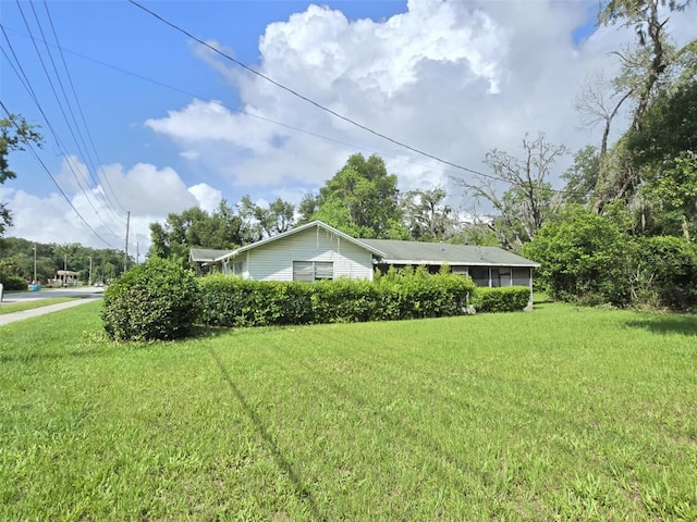 18248 High Springs Main St, High Springs, FL 32643 - view of property exterior with a lawn