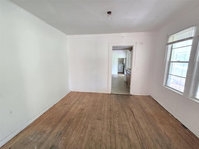 18248 High Springs Main St, High Springs, FL 32643 - unfurnished room featuring wood-type flooring and healthy amount of natural light