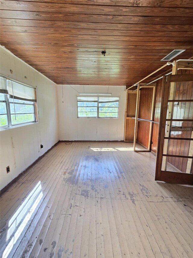 18248 High Springs Main St, High Springs, FL 32643 - unfurnished room featuring wood-type flooring and wooden ceiling