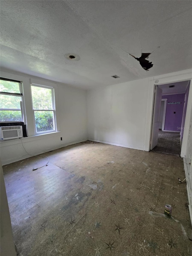 18248 High Springs Main St, High Springs, FL 32643 - unfurnished room with cooling unit and a textured ceiling
