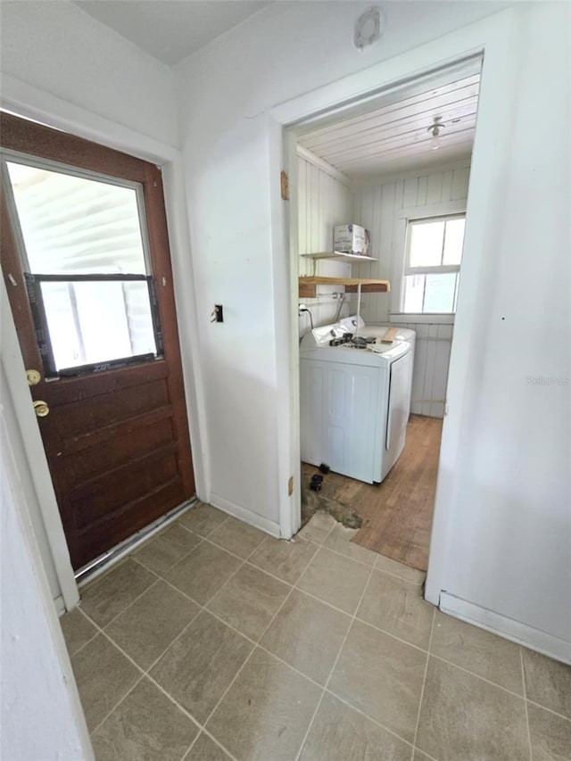 18248 High Springs Main St, High Springs, FL 32643 - laundry room featuring washer / clothes dryer and light tile patterned flooring