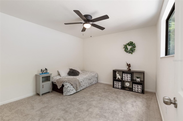 303 SW 54th Dr, Gainesville, FL 32607 - bedroom featuring carpet flooring and a ceiling fan