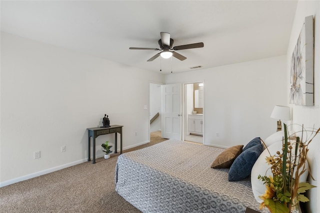 303 SW 54th Dr, Gainesville, FL 32607 - bedroom with carpet floors, connected bathroom, and a ceiling fan