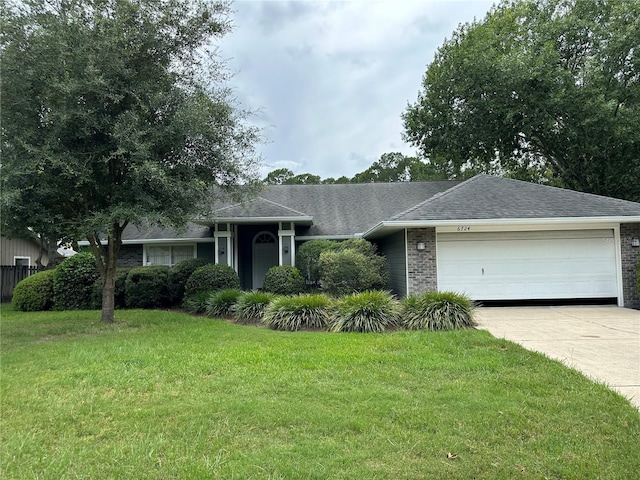 6724 NW 34th Dr, Gainesville, FL 32653 - single story home with an attached garage, concrete driveway, a front yard, and brick siding