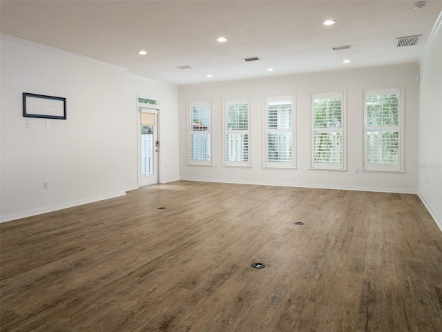 441 SW 129th Ter, Newberry, FL 32669 - spare room with wood finished floors, recessed lighting, and crown molding