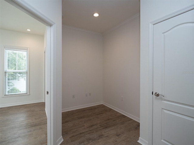 441 SW 129th Ter, Newberry, FL 32669 - spare room featuring dark wood-style floors, ornamental molding, and recessed lighting
