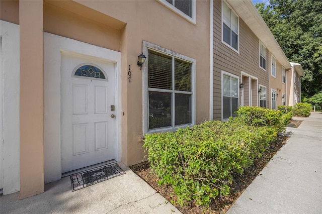 4415 SW 34th St Unit 107, Gainesville, FL 32608 - property entrance featuring stucco siding