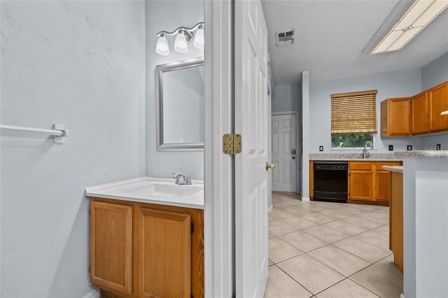 4415 SW 34th St Unit 107, Gainesville, FL 32608 - bathroom with two vanities and tile patterned flooring