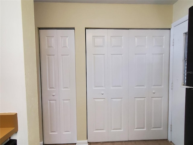 2207 SW 39th Dr, Gainesville, FL 32607 - unfurnished bedroom featuring two closets
