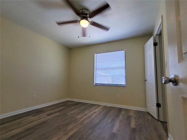 2207 SW 39th Dr, Gainesville, FL 32607 - unfurnished bedroom with dark wood-style flooring and a ceiling fan