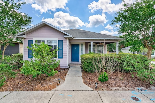 3701 NW 26th St, Gainesville, FL 32605 - bungalow-style house featuring a porch and ceiling fan