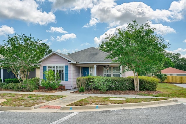 3701 NW 26th St, Gainesville, FL 32605 - view of front facade featuring a porch