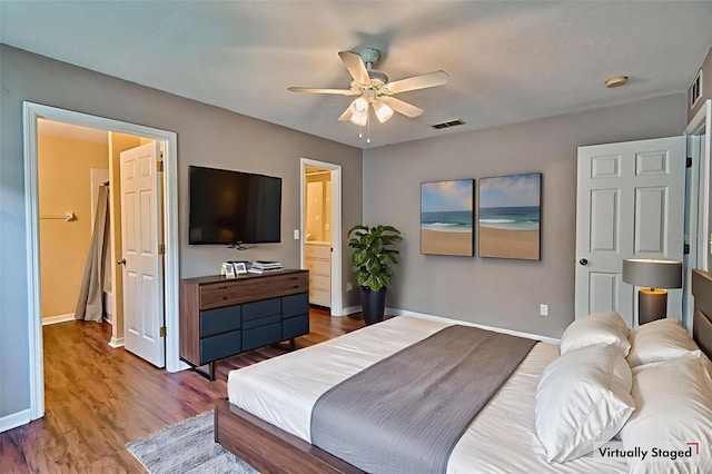 3701 NW 26th St, Gainesville, FL 32605 - bedroom with wood finished floors and a ceiling fan