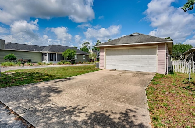 3701 NW 26th St, Gainesville, FL 32605 - view of side of property with a garage