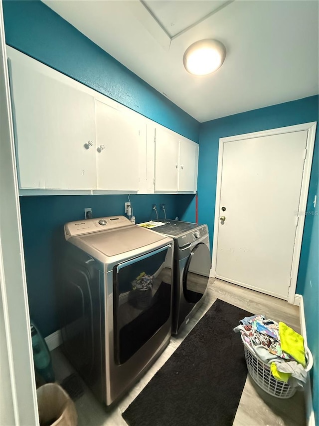 1510 SE 14th Ave, Gainesville, FL 32641 - laundry room featuring cabinet space and independent washer and dryer