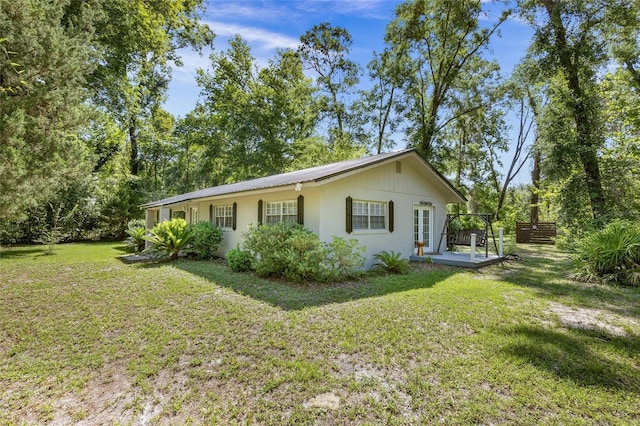 4923 SW Ichetucknee Ave, Fort White, FL 32038 - view of front of house with french doors and stucco siding