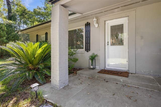 4923 SW Ichetucknee Ave, Fort White, FL 32038 - property entrance featuring stucco siding