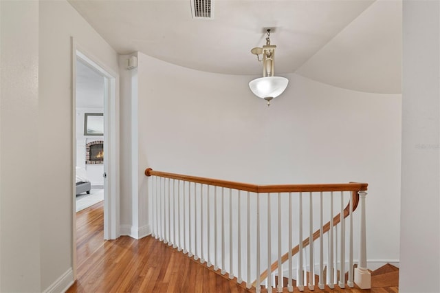 2506 SW 9th Dr, Gainesville, FL 32601 - hall featuring an upstairs landing and wood finished floors