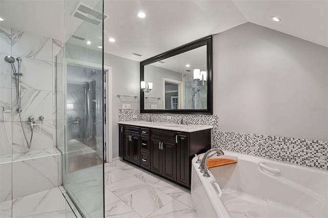 2506 SW 9th Dr, Gainesville, FL 32601 - full bath featuring double vanity, a marble finish shower, a bath, recessed lighting, and vaulted ceiling