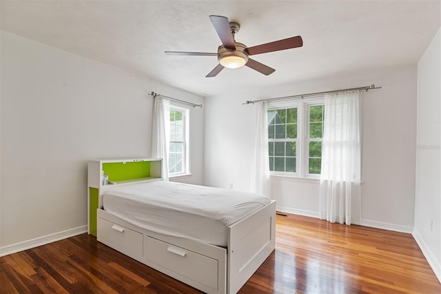 2506 SW 9th Dr, Gainesville, FL 32601 - bedroom featuring wood finished floors and a ceiling fan
