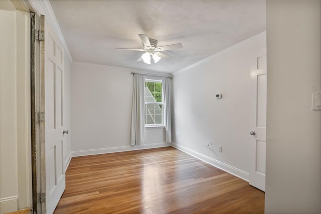 2506 SW 9th Dr, Gainesville, FL 32601 - unfurnished bedroom with light wood-style flooring, crown molding, and a ceiling fan