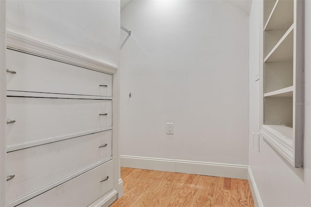 2506 SW 9th Dr, Gainesville, FL 32601 - walk in closet with light wood-style flooring