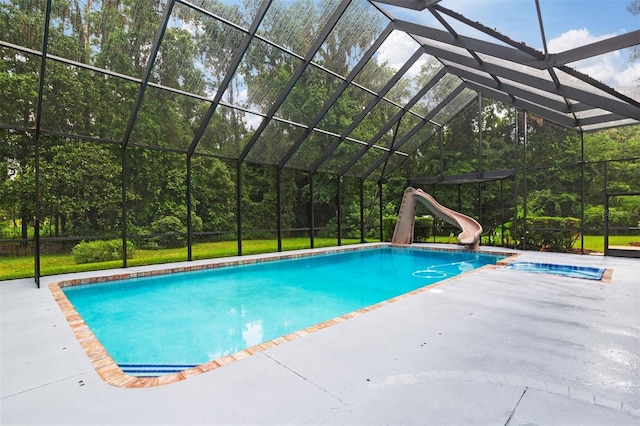 2506 SW 9th Dr, Gainesville, FL 32601 - view of swimming pool with a water slide, a patio, a lanai, and a pool with connected hot tub