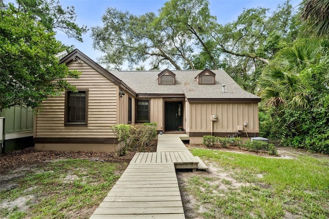 5328 SW 88th Ct, Gainesville, FL 32608 - view of front of home with board and batten siding and roof with shingles