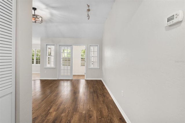 5328 SW 88th Ct, Gainesville, FL 32608 - unfurnished living room with hardwood / wood-style floors and lofted ceiling