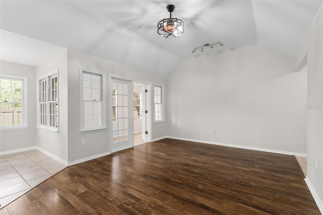 5328 SW 88th Ct, Gainesville, FL 32608 - entrance foyer featuring vaulted ceiling and wood-type flooring