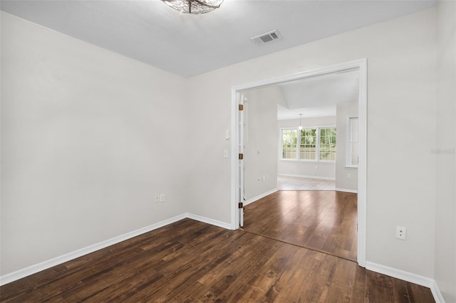 5328 SW 88th Ct, Gainesville, FL 32608 - empty room with dark wood-style floors and baseboards