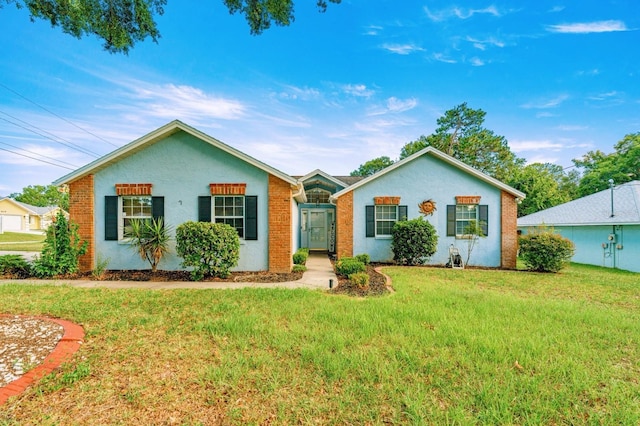3292 NE 42nd Pl, Ocala, FL 34479 - single story home with a front lawn and stucco siding