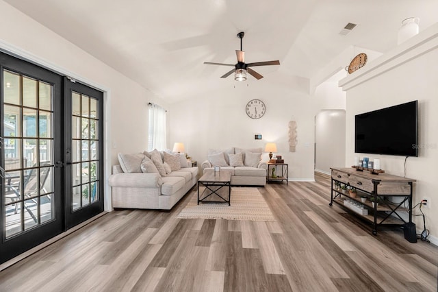 3292 NE 42nd Pl, Ocala, FL 34479 - living area with french doors, wood finished floors, a ceiling fan, and lofted ceiling