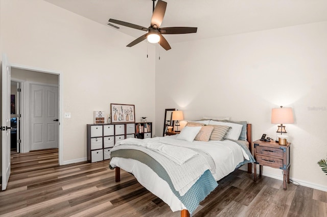 3292 NE 42nd Pl, Ocala, FL 34479 - bedroom featuring wood finished floors, high vaulted ceiling, and ceiling fan